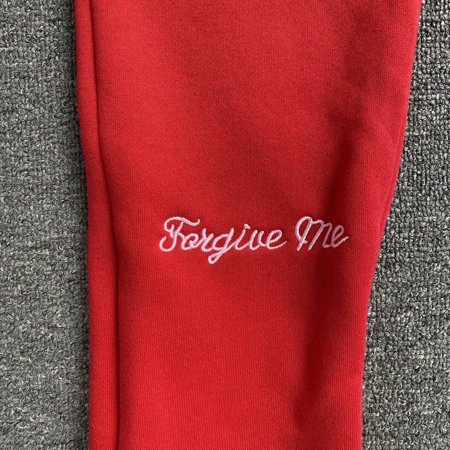 Pantalon de survêtement rouge SYNA WORLD avec logo SYNA