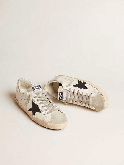 Baskets Golden Goose Super-Star blanches et noires