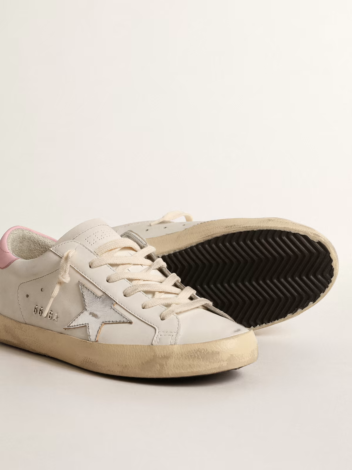 Baskets Golden Goose Super-Star blanches et roses