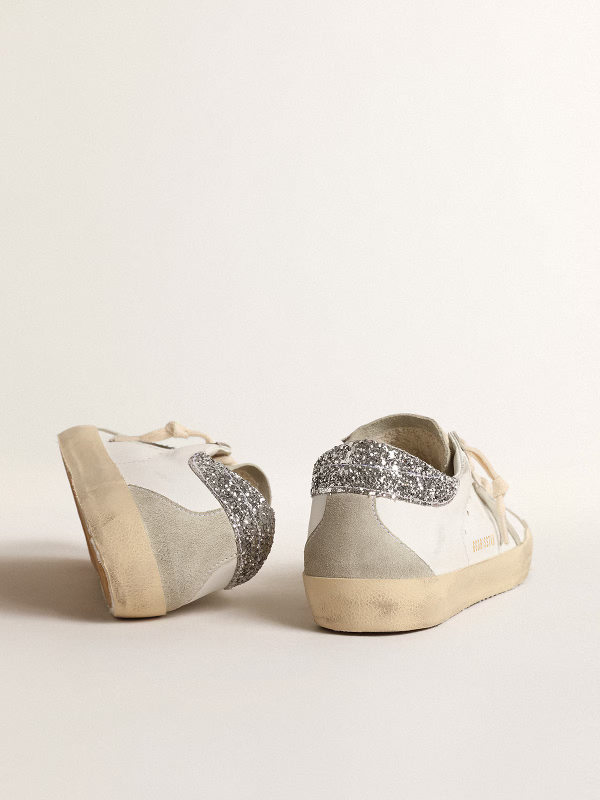 Golden Goose Superstar – Cuir blanc avec talon à paillettes argentées