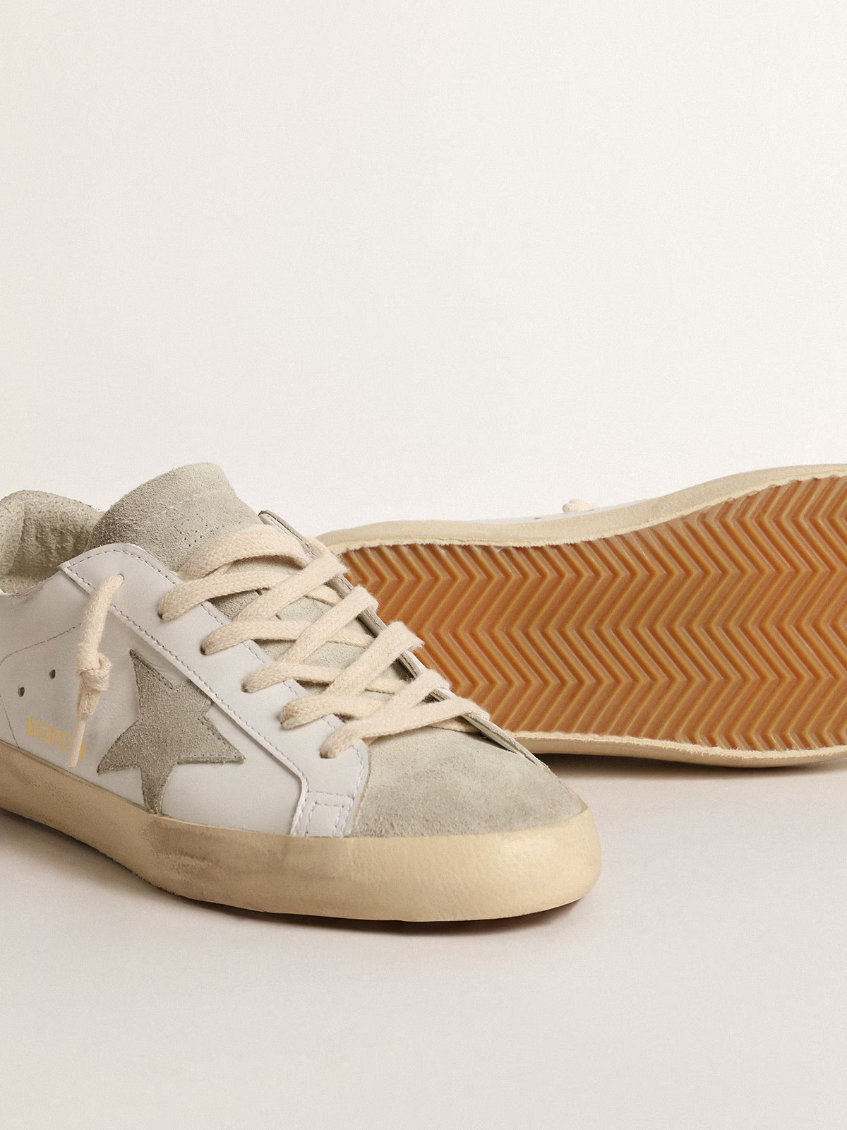 Golden Goose Superstar – Cuir blanc avec talon à paillettes argentées