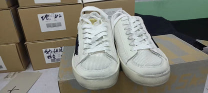 Baskets Stardan en maille blanche avec étoile en daim noir et languette arrière en cuir blanc