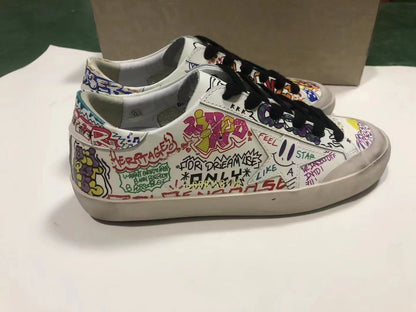 Baskets de star en cuir blanc avec imprimé graffiti multicolore