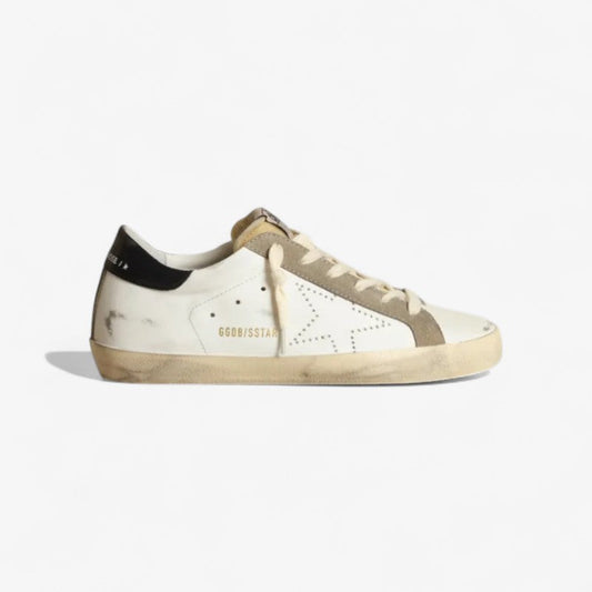 Baskets Superstar pour femmes avec étoile perforée et languette arrière en cuir bleu nuit brillant