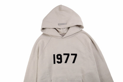 Sweat à capuche FEAR OF GOD ESSENTIALS « 1977 » gris pierre