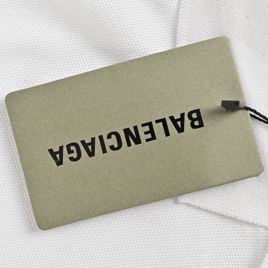 Polo blanc Balenciaga à logo BB