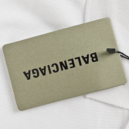 Polo blanc Balenciaga à logo BB
