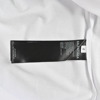 Polo blanc Balenciaga à logo BB