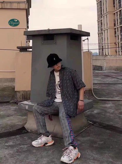 Chemise à carreaux Balenciaga à logo intégral