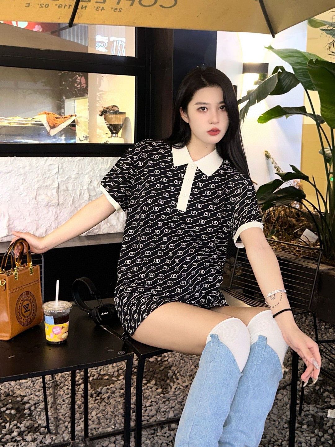 Polo Gucci noir et beige à motifs