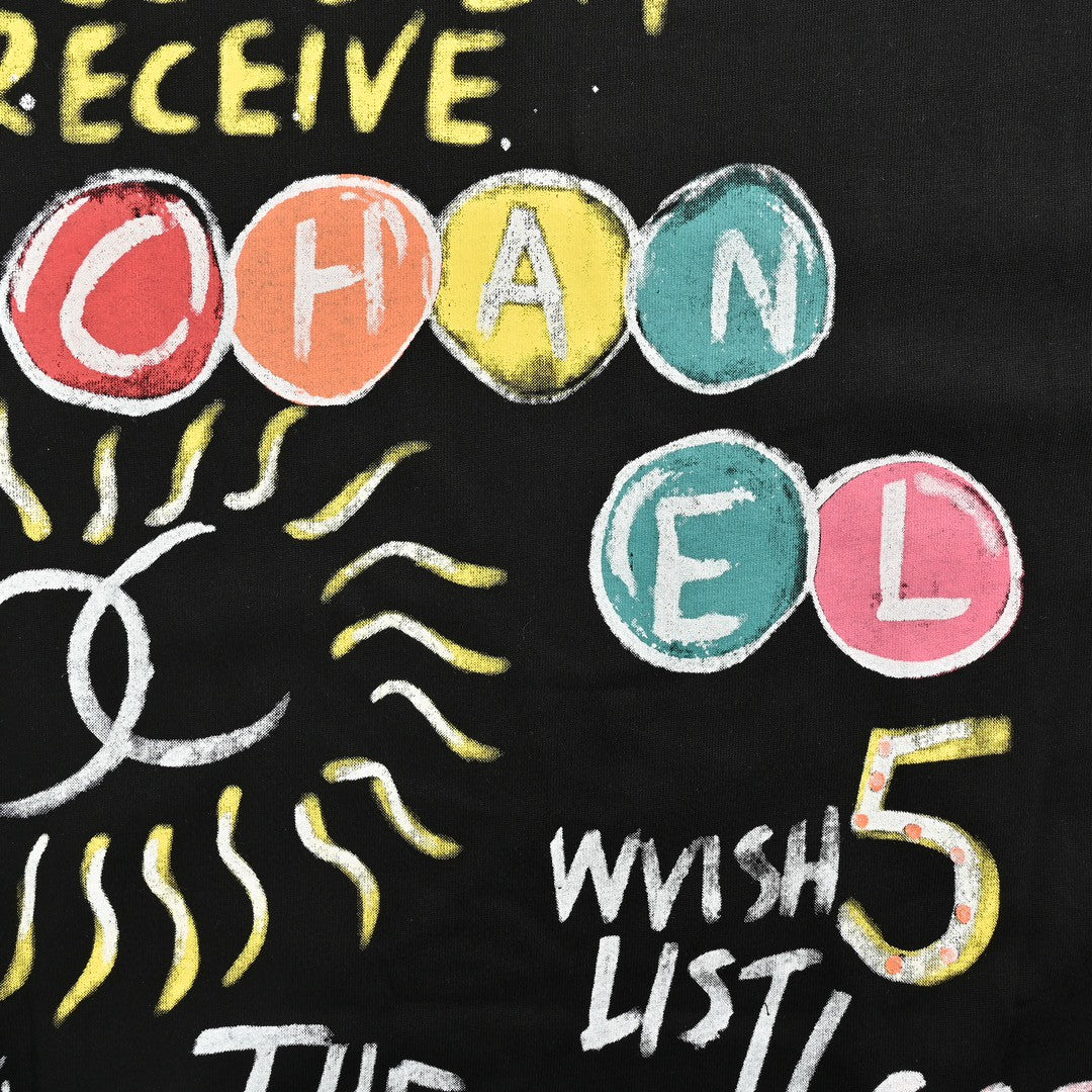 T-shirt Chanel « Les femmes sauveront le monde » noir