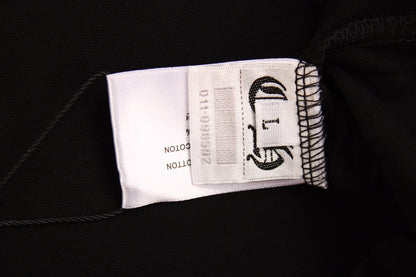 T-SHIRT NOIR ET ROSE AVEC LOGO DE FER À CHEVAL ET CŒURS CHROMÉS