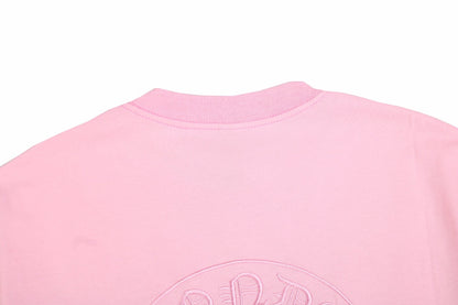 T-SHIRT ROSE AVEC LOGO DE FER À CHEVAL ET CŒURS CHROMÉS