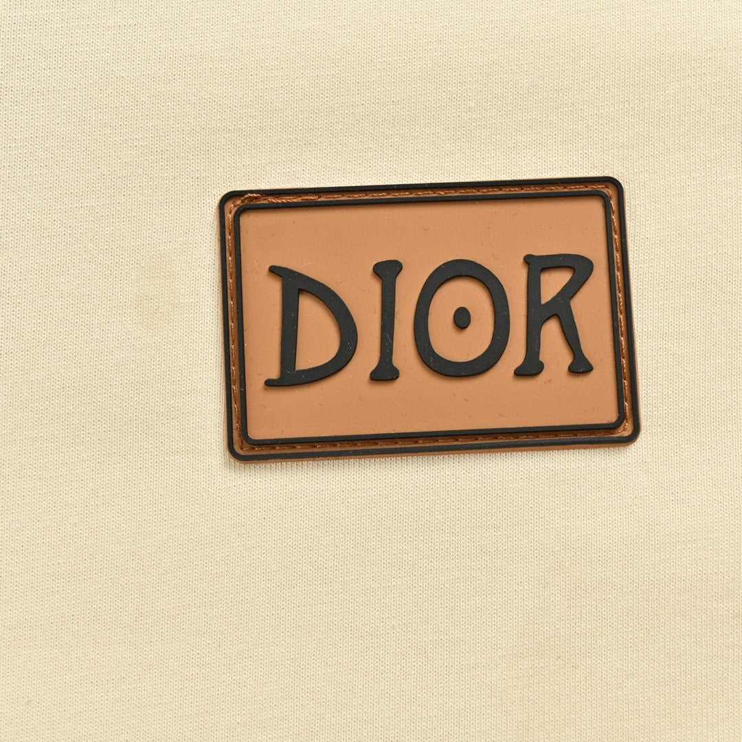 T-shirt crème Dior avec bordure noire
