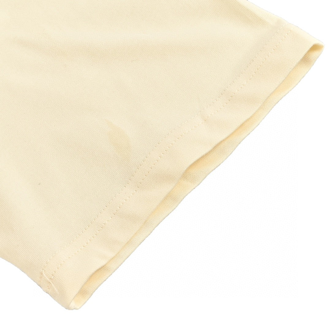 T-shirt crème Dior avec bordure noire