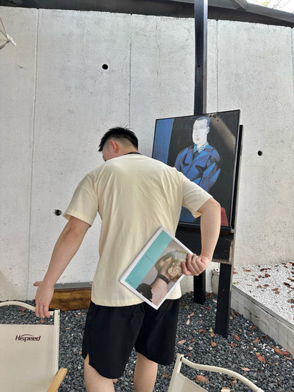 T-shirt crème Dior avec bordure noire