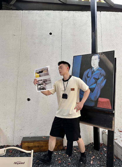 T-shirt crème Dior avec bordure noire