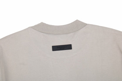 T-SHIRT FEAR OF GOD ESSENTIALS GRIS PIERRE