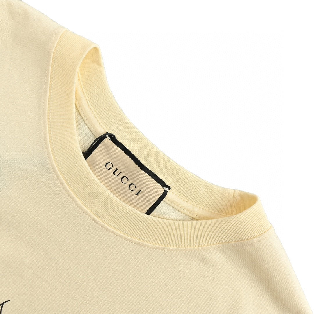 T-shirt Gucci avec logo vache de dessin animé (crème)