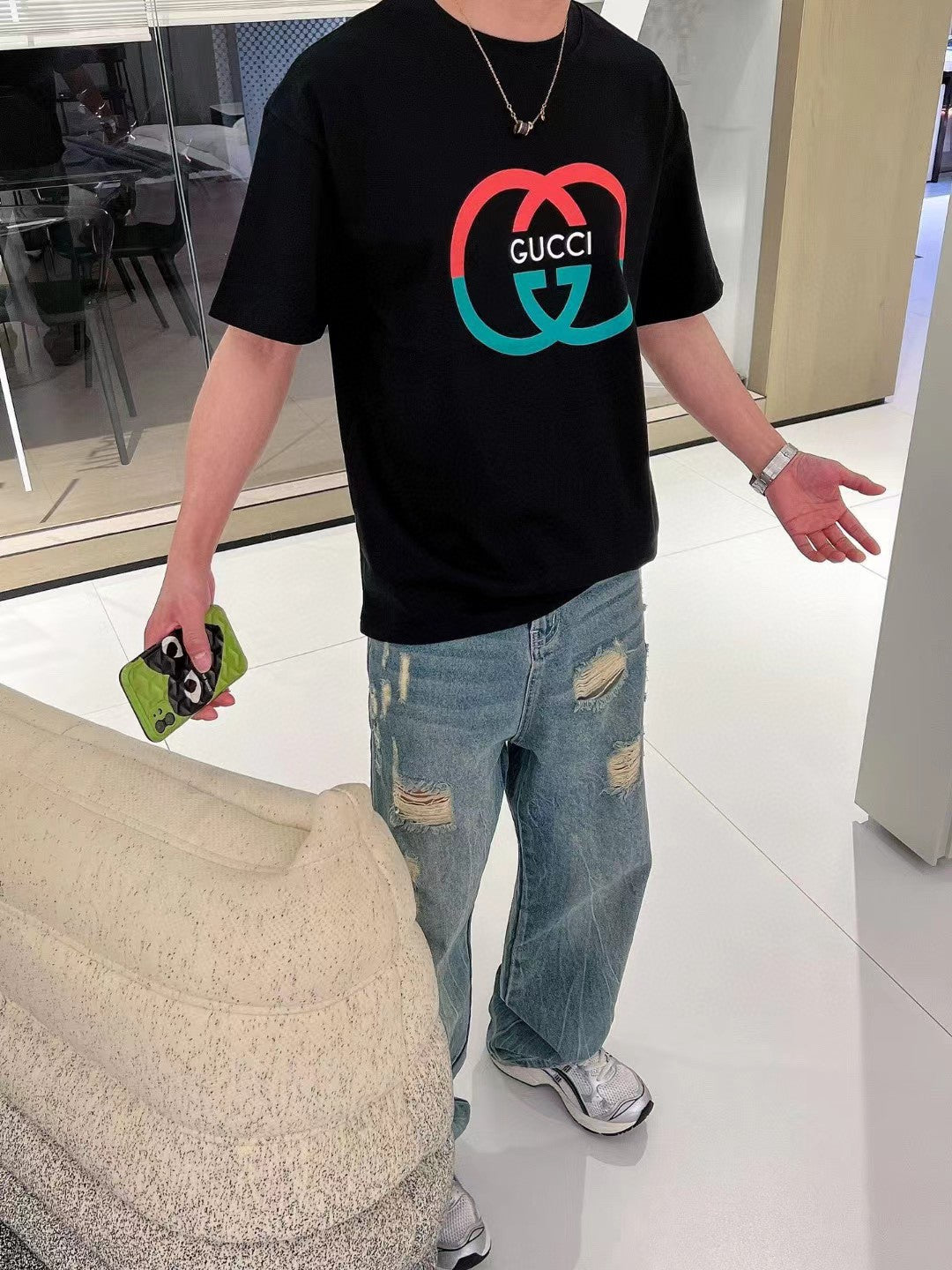 T-shirt noir Gucci à motif GG entrelacé