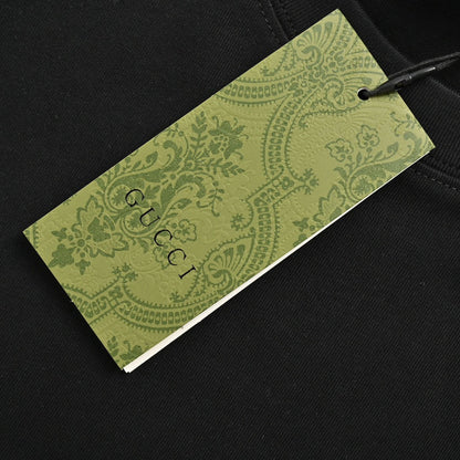 T-shirt noir Gucci à logo triangulaire