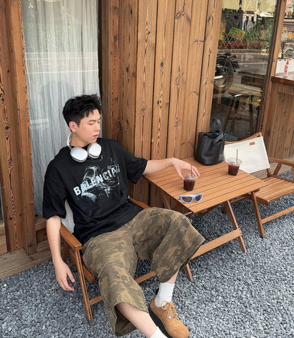 T-shirt Balenciaga à logo imprimé fumée (noir)