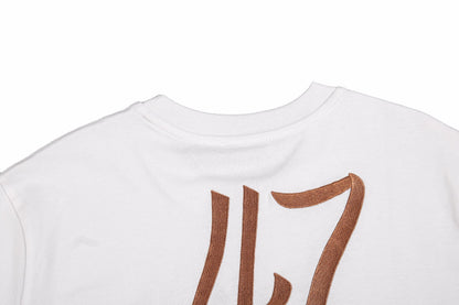 T-shirt Dior à logo script (blanc)