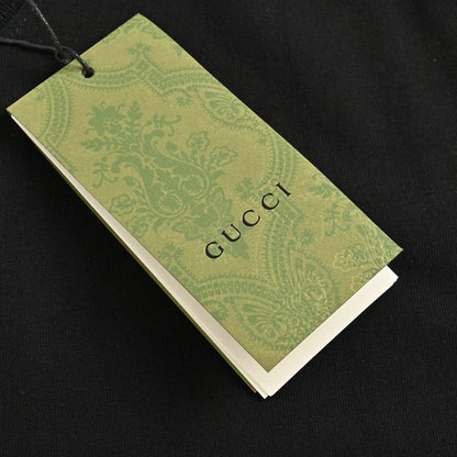 T-shirt noir Gucci à motif dinosaure