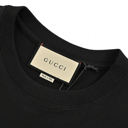 T-shirt noir Gucci à motif dinosaure