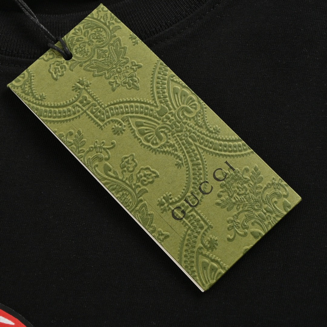 T-shirt noir Gucci à motif cœur