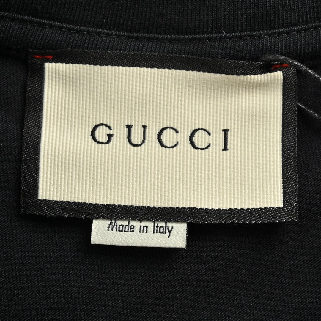 T-shirt Gucci à logo éclaboussé (noir)
