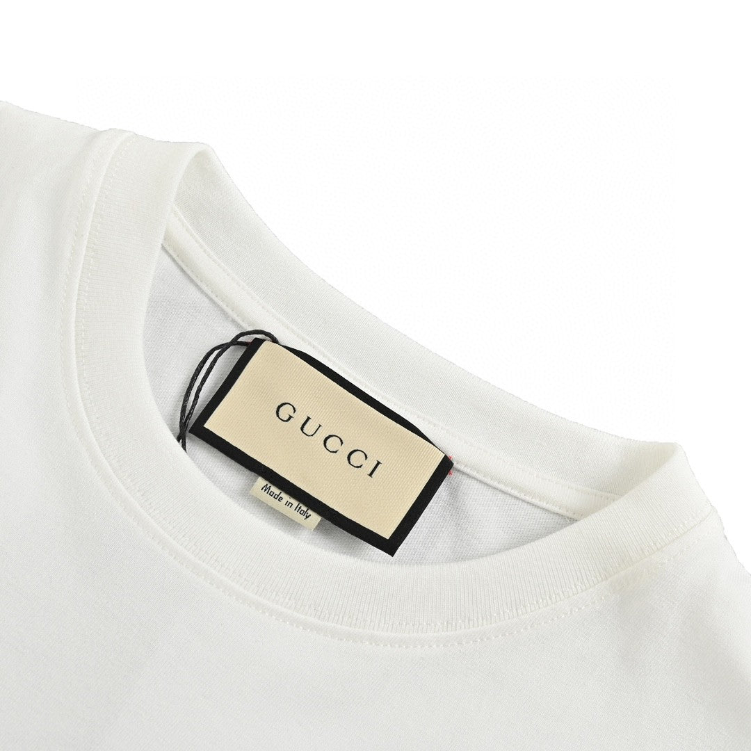 T-shirt blanc Gucci à motif dinosaure rose