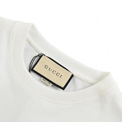 T-shirt blanc Gucci à motif dinosaure rose