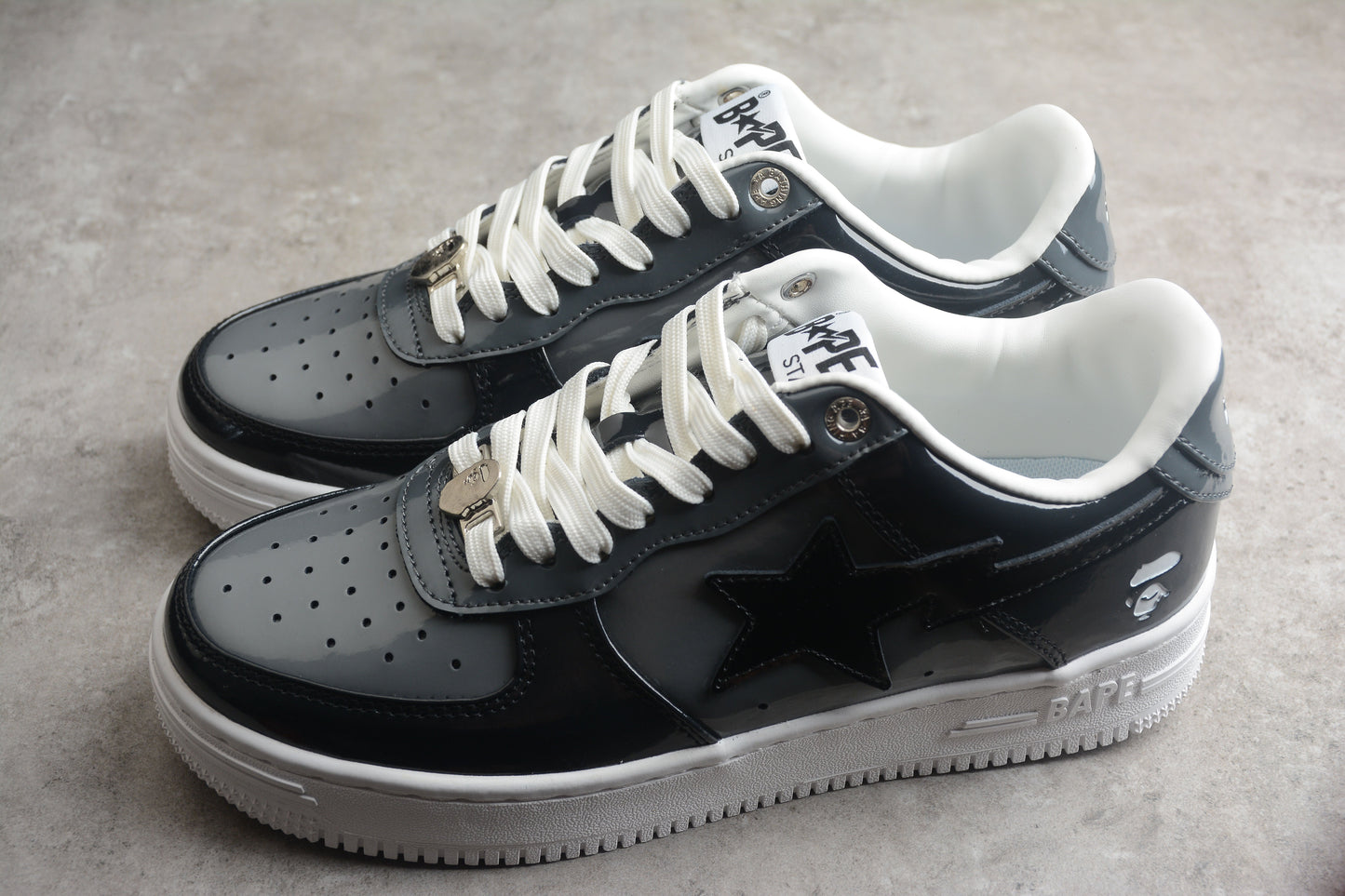 Baskets basses BAPE STA en cuir verni noir