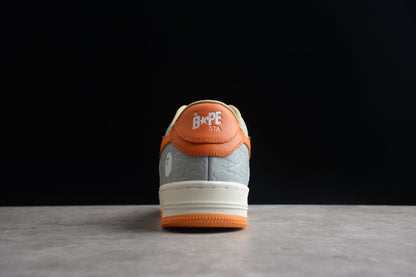 Baskets basses BAPE STA orange et grises