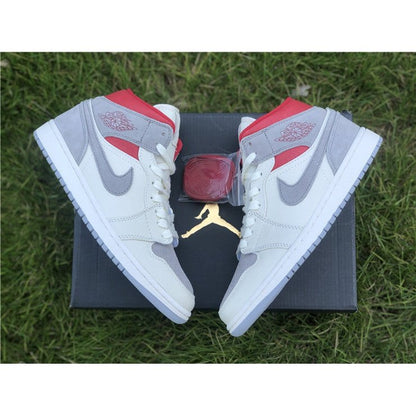 Baskets Jordan 1 Mid SNEAKERSNSTUFF 20e anniversaire 