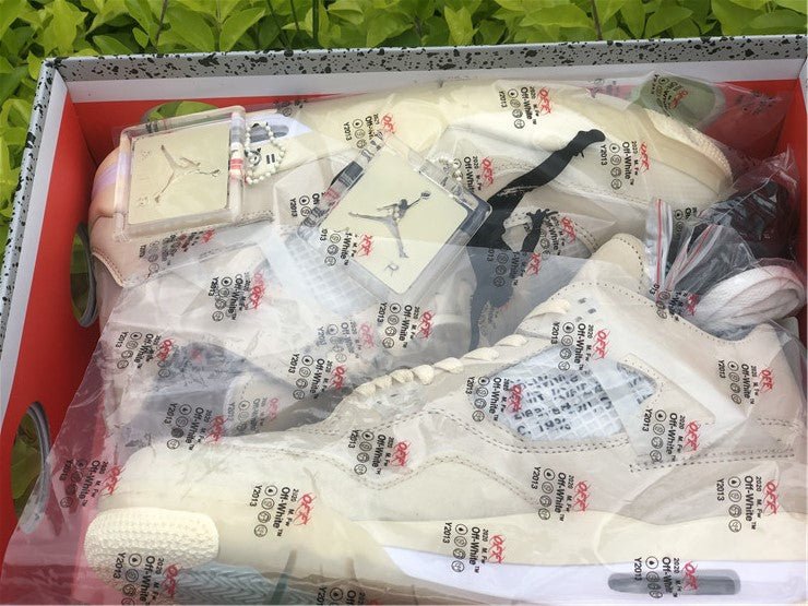 JORDAN 4 x BLANC CASSÉ