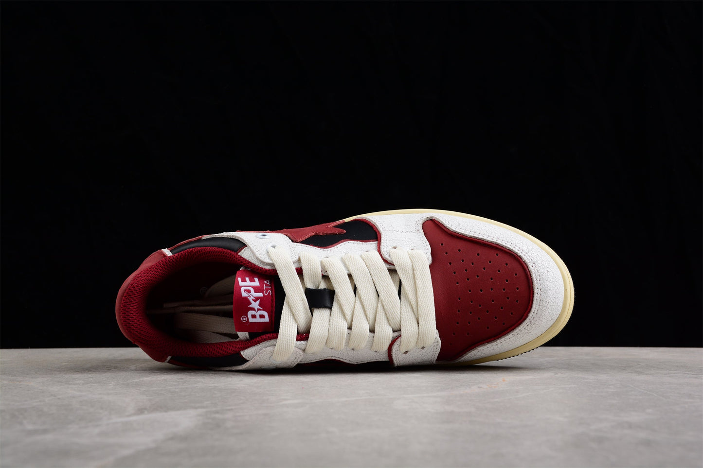 Baskets basses BAPE STA rouges, blanches et noires