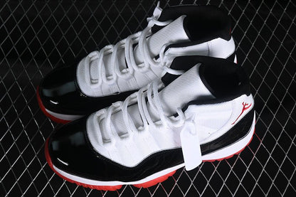 AIR JORDAN 11 RETRO NOIR/BLANC/ROUGE