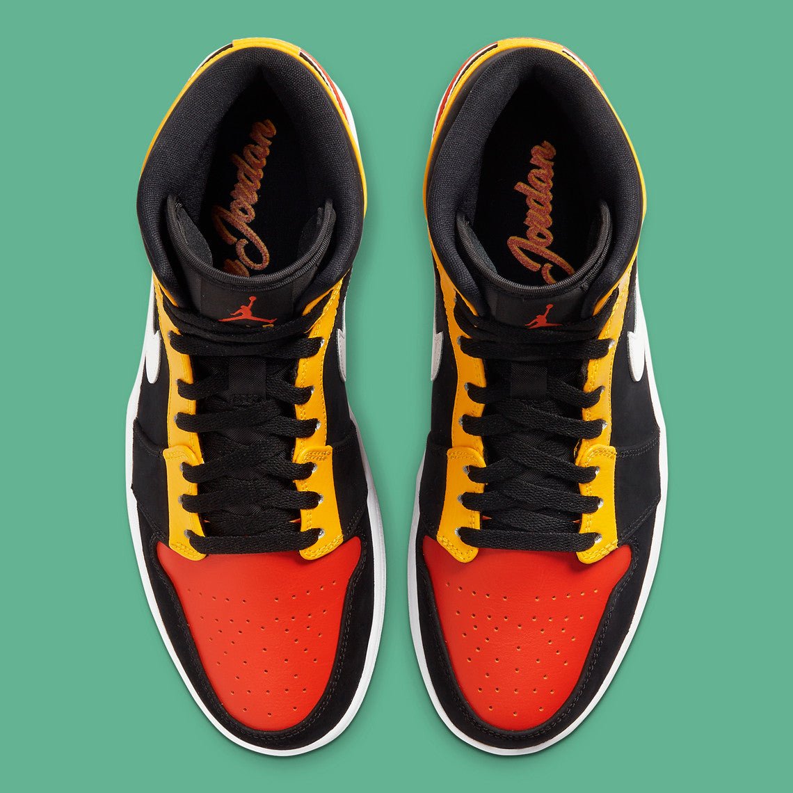 JORDAN 1 MID x NOIR AMARILLO ORANGE 