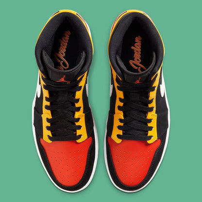 JORDAN 1 MID x NOIR AMARILLO ORANGE 
