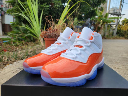JORDAN 11 Orange et Blanc