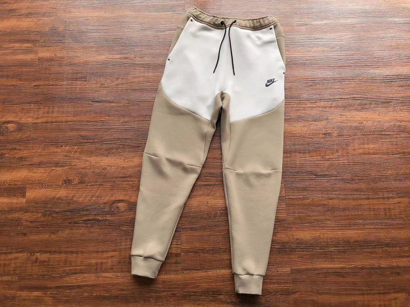 Pantalon en polaire technique Nike x Bois de santal/Blanc os clair