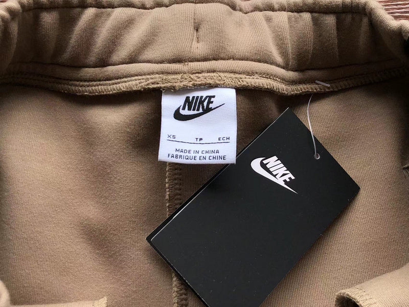Pantalon en polaire technique Nike x Bois de santal/Blanc os clair