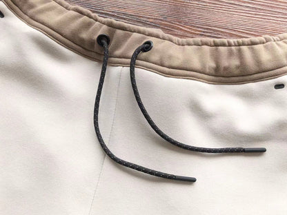 Pantalon en polaire technique Nike x Bois de santal/Blanc os clair