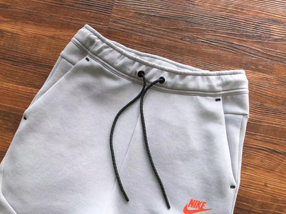 Pantalon Nike Tech Fleece x Gris Loup/Aigue-marine/Orange
