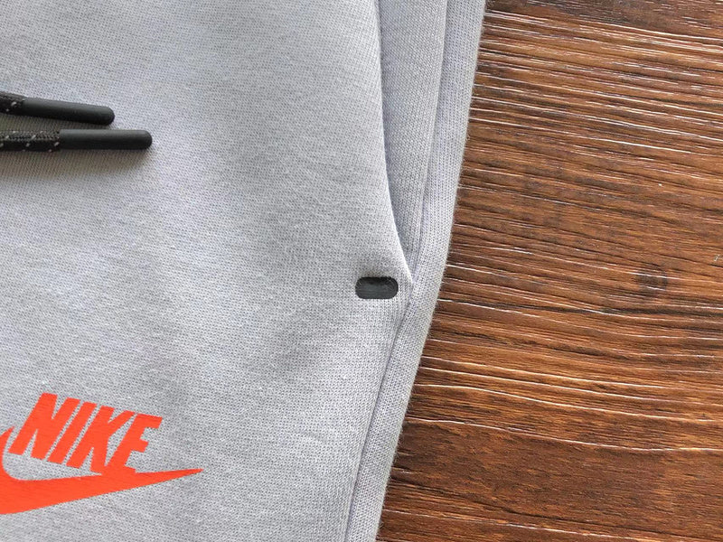 Pantalon Nike Tech Fleece x Gris Loup/Aigue-marine/Orange