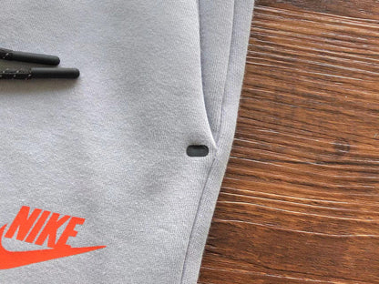 Pantalon Nike Tech Fleece x Gris Loup/Aigue-marine/Orange