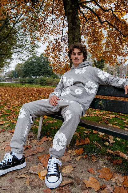 PANTALON DE SURVÊTEMENT GRIS À COURONNE DE COTON EN JEAN DÉCHIRÉ