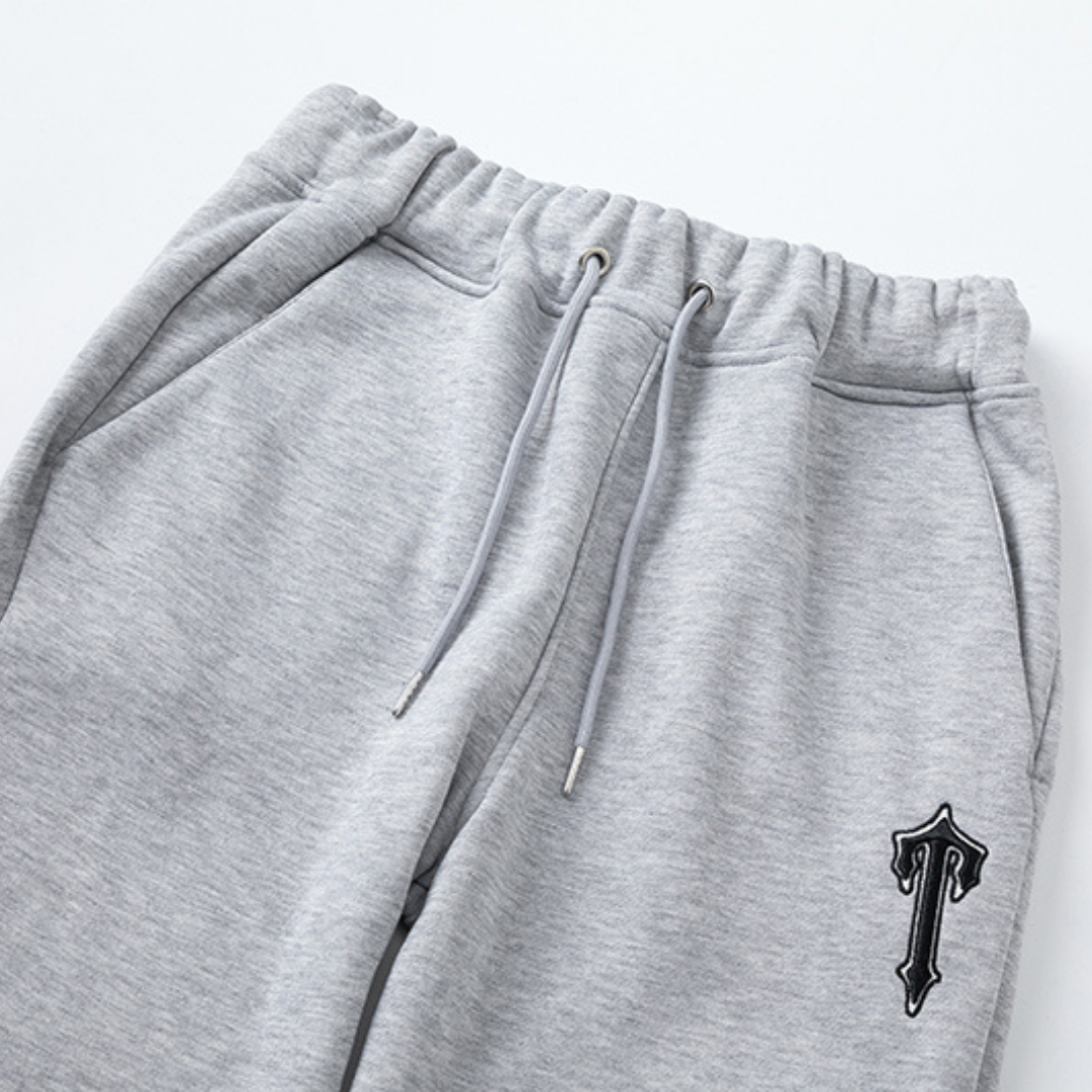 Survêtement bleu à capuche et rayures en V